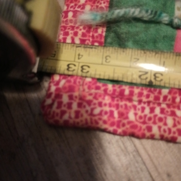 Beautiful pink backing quilt with yarn ties. - Picture 2 of 16